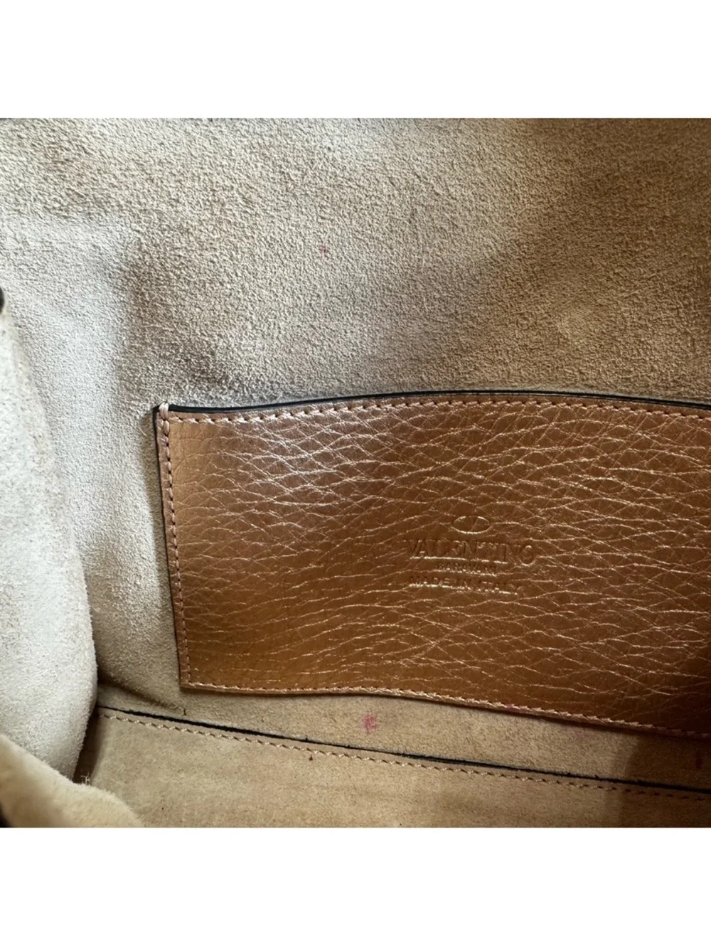 Valentino purchased used metallic